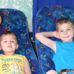 Evan & Noah Chillaxing inthe air conditioned bus