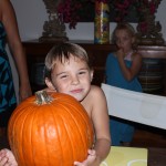 Noah and our family pumpkin