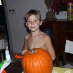 Evan and our family pumpkin