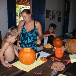 Noah & Evan planning the pumpkin design with mom