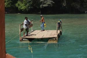 Raft guides take you across the base of the falls